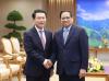 PM Phạm Minh Chính receives Lao Deputy PM, Foreign Minister