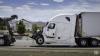 Prosecutors say a hit man killed a federal witness tied to staged 18-wheeler crashes