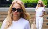 Pamela Anderson looks casual chic in all-white ensemble while shopping in Malibu