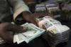 Economy15 minutes ago Naira Cools to N1,360 Per Dollar at Official FX Market