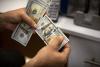 Iraq lowers currency exchange rate to 1,500 dinars per US dollar