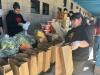 At Toltecalli High food bank, community-based learning helps elders, student graduate rates