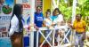 Two families with 10 children receive homes from Food for the Poor, National Baking Company Foundation