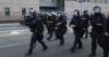 Officers throw flash bangs to disperse crowd protesting immigration enforcement in Los Angeles