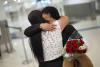 Some visitors report extra scrutiny at airports as new travel ban begins