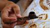Ancient batik: Wax-resist textile dyeing techniques"