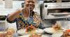 Local chef Mawa McQueen makes her way to the grand stage for the first time at the Food & Wine Classic