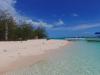 This Little Island in The Bahamas Has Electric-Blue Water and Legendary Beach Bars 