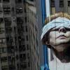 A Buenos Aires mural in honor of the 85 dead and more than 300 wounded in an 1994 attack on the Jewish community center of the Mutual Israelite Association of Argentina (AMIA)