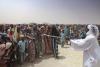 Sudan civil war overwhelms border town in neighboring Chad as refugees find little help