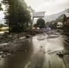 Terrifying vids show flash floods surging through Italian towns leaving at least one dead & dozens trapped after storm