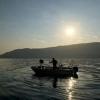 Fisherman Viktor Kocaj hauls in his net early in the morning in Albania's Vlore Bay