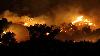 Tourists told to flee as fast-moving wildfires take hold on Crete