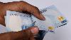 Naira firms up after banks resume international usage of local currency cards