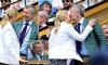 King Frederik of Denmark laughs and chats with Duchess of Edinburgh at Wimbledon's royal box - as he attends tennis tournament without his wife Queen Mary