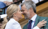 Sophie embraces the King of Denmark as the second week of Wimbledon gets underway