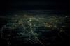 Airline pilot Rico X. photographs cities from the sky