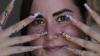 Cuban women embrace extravagant nail art despite economic hardships