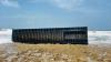 Headed from ‘Hong Kong to Dubai’, shipping container lands on beach in Gir-Somnath
