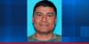Man wanted in large-scale Alabama raid surrenders to authorities