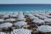 Analysis-France's plan to cull public holidays may not help the economy