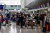 ‘Absurd turnaround times’: Airport workers blame airlines for strikes that have caused summer holiday misery around Europe