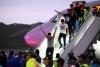 Shackled and paraded, now home: El Salvador frees 252 Venezuelan migrants in US prisoner swap