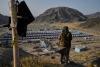 World Associated Press Taliban tortured and threatened Afghans expelled from Pakistan and Iran, UN report says