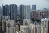 Singapore home prices rise more than estimated before curbs