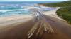 Community crowds Denmark’s Ocean Beach to see the opening of Wilson Inlet into the Southern Ocean