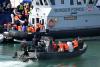 Britain begins detaining 'small boat' migrants to send back to France