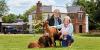 Meet Britain's most experienced dog sitters: The retired couple saving on bills and travelling the UK