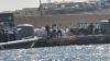 At least 26 people killed as boat carrying migrants capsizes off Italy