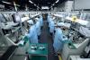 China's factory output, retail sales growth slump in blow to economy