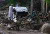 220 killed in Pakistan floods as rescuers pull more bodies from landslides