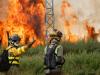 Spain battles 20 big wildfires, deploys 500 more soldiers in searing heat