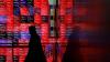 Japan's Nikkei hits record high as automakers rise on weaker yen