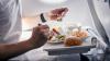 Your Airplane Food Might Taste Better If You Wear These While In The Sky