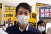 Former Hong Kong lawmaker says Australian asylum grant highlights rights violations