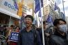 China angered as Hong Kong activists granted asylum in UK, Australia