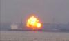 Explosion reported as cargo ship catches fire in Baltimore Harbor