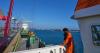 A ship with hundreds of tons of food aid for Gaza nears an Israeli port after leaving...