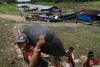 Residents of a remote island disputed by Colombia hope their Peruvian government won't forget them