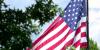 Ravenna woman charged with stealing flag from Erie County business