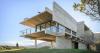cristian nanzer’s house on el dragón rises from cyclopean stone base in argentina