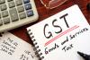 Govt proposes major GST reforms: Relief likely for healthcare, auto, travel & FMCG