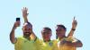 Former Brazilian President Jair Bolsonaro, centre, and his sons Eduardo Bolsonaro, left, and Flavio Bolsonaro in Rio de Janeiro in 2024.