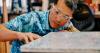 You got empty shampoo plastic containers? G3 Makerspace collects plastics, turns them into school desks