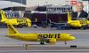 Spirit Airlines in chaos as budget carrier files for bankruptcy just months after first collapse as it vows fleet cuts and 'hundreds of millions' in savings
