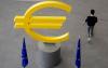 Cyprus supports the euro for the EU, questions its value domestically